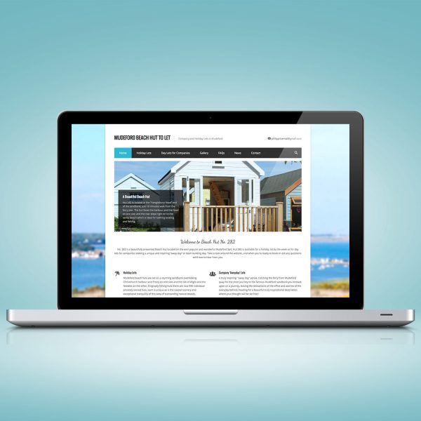The Mudeford website design on a laptop