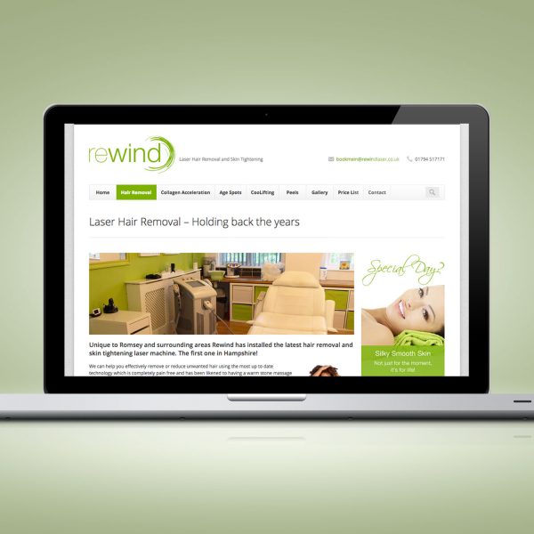A subpage from the website design on a laptop
